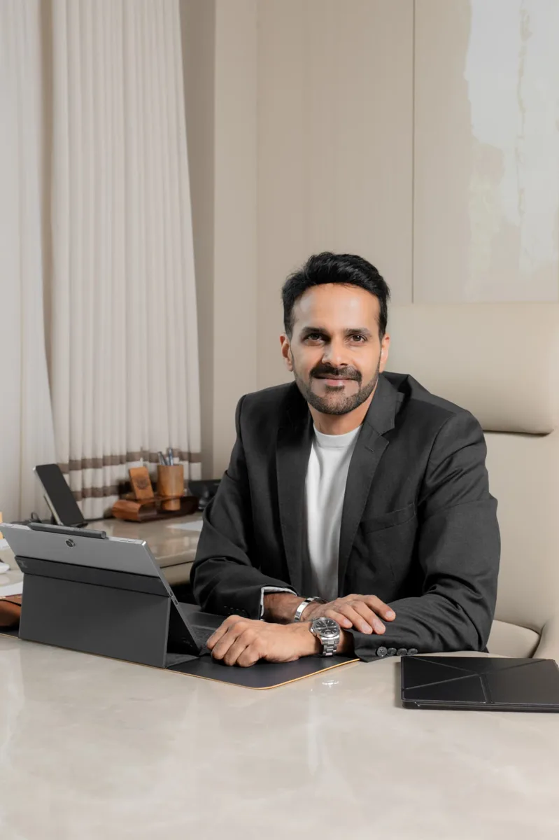 Coach Vijay Johar at his desk